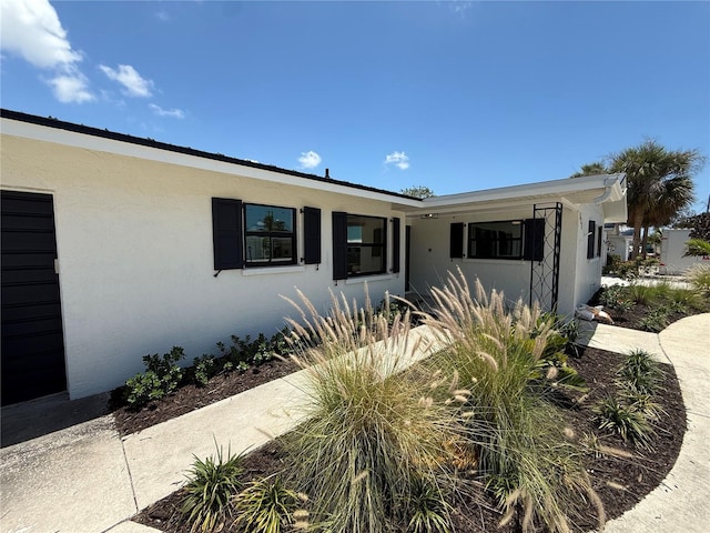 808 25th Ave W, Palmetto, FL 34221 - view of front facade featuring stucco siding