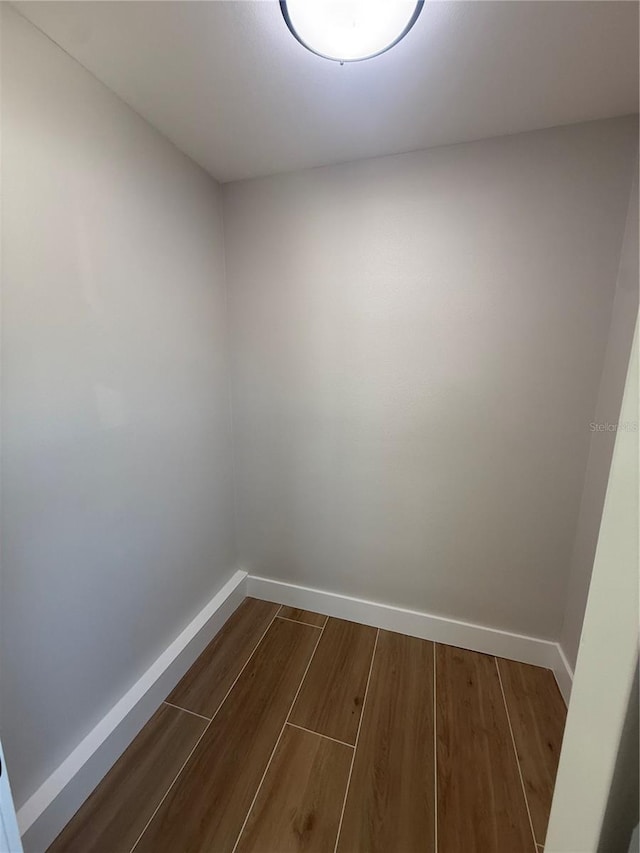 808 25th Ave W, Palmetto, FL 34221 - unfurnished room with baseboards and dark wood finished floors