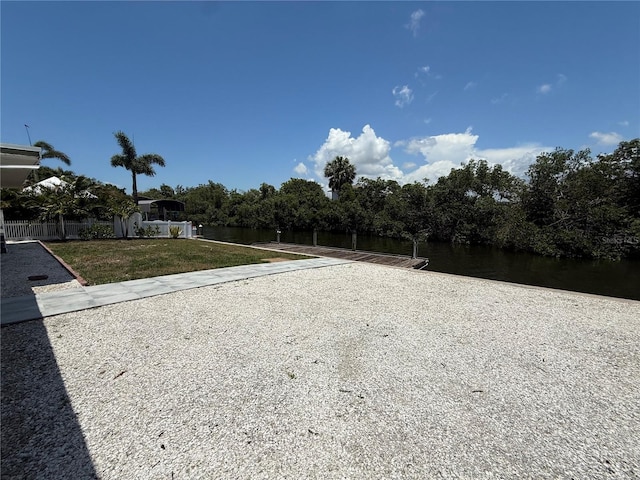 808 25th Ave W, Palmetto, FL 34221 - view of grassy yard featuring a boat ramp, a water view, and a boat dock