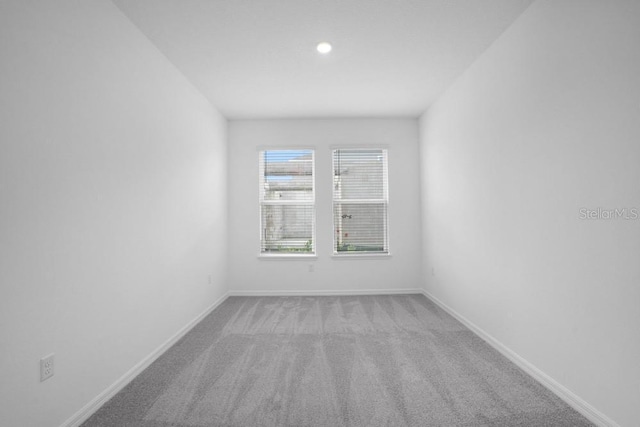 8632 Snowfall St, Sarasota, FL 34241 - empty room featuring carpet floors and recessed lighting