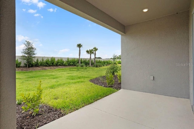 8632 Snowfall St, Sarasota, FL 34241 - view of grassy yard with a patio area