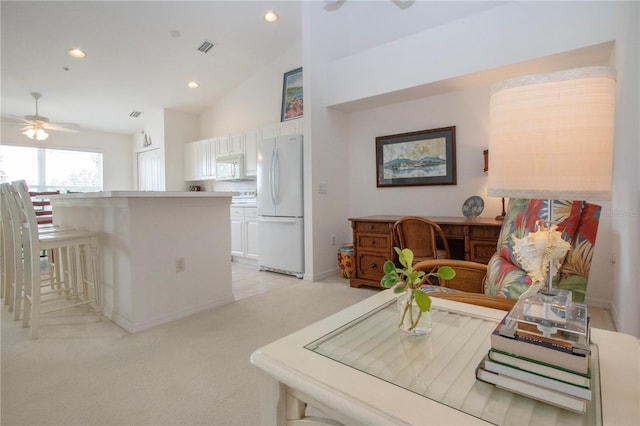5330 Hyland Hills Ave Unit 2324, Sarasota, FL 34241 - living area with a ceiling fan, light carpet, high vaulted ceiling, and recessed lighting