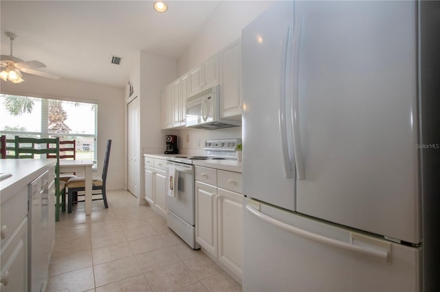 5330 Hyland Hills Ave Unit 2324, Sarasota, FL 34241 - kitchen featuring white appliances, light countertops, white cabinetry, ceiling fan, and light tile patterned floors