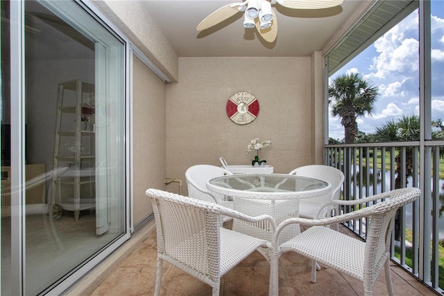 5330 Hyland Hills Ave Unit 2324, Sarasota, FL 34241 - sunroom / solarium with a ceiling fan and a water view