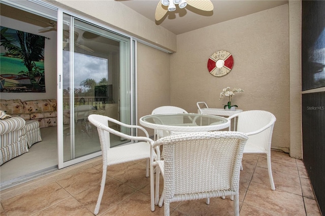 5330 Hyland Hills Ave Unit 2324, Sarasota, FL 34241 - dining space with a ceiling fan, tile patterned floors, and a textured wall