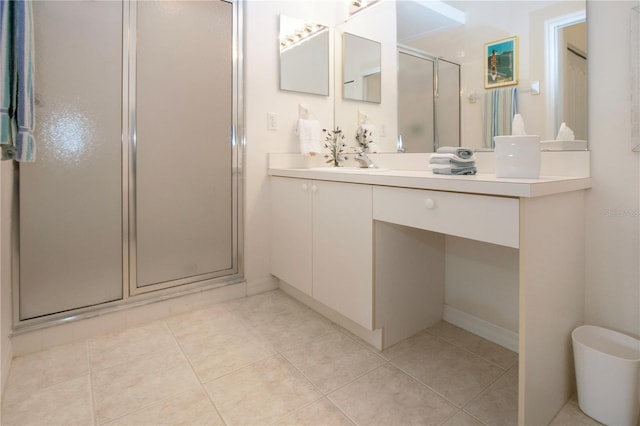 5330 Hyland Hills Ave Unit 2324, Sarasota, FL 34241 - bathroom with a stall shower, vanity, tile patterned floors, and baseboards