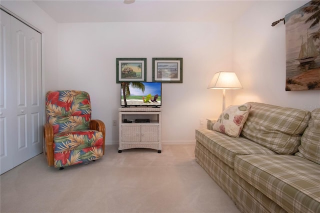 5330 Hyland Hills Ave Unit 2324, Sarasota, FL 34241 - carpeted living area featuring baseboards