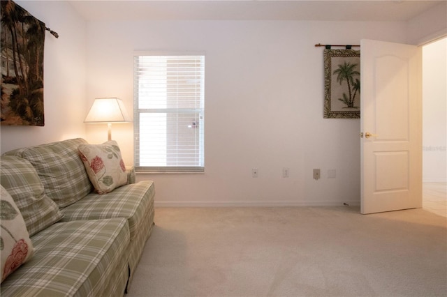 5330 Hyland Hills Ave Unit 2324, Sarasota, FL 34241 - living area featuring light carpet, plenty of natural light, and baseboards