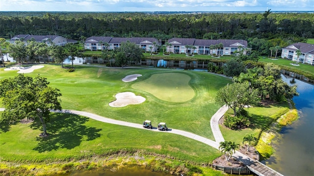 5330 Hyland Hills Ave Unit 2324, Sarasota, FL 34241 - aerial perspective of suburban area with a local golf course, a large body of water, and a forest