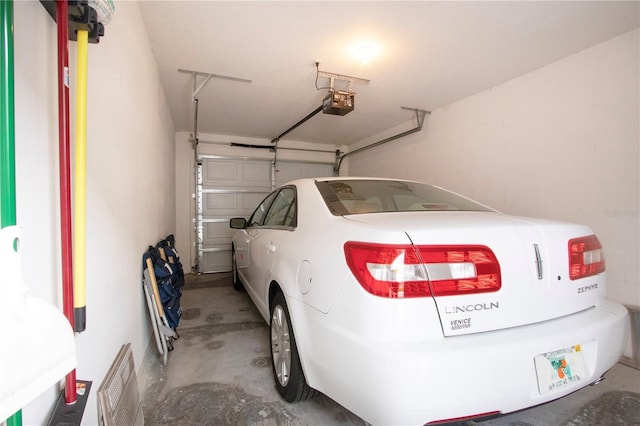 5330 Hyland Hills Ave Unit 2324, Sarasota, FL 34241 - garage featuring a garage door opener