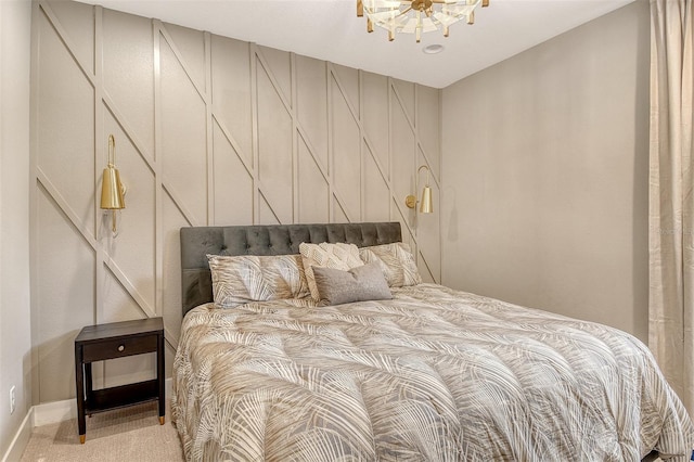 1919 Woodleaf Hammock Ct, Bradenton, FL 34211 - carpeted bedroom with a chandelier and baseboards