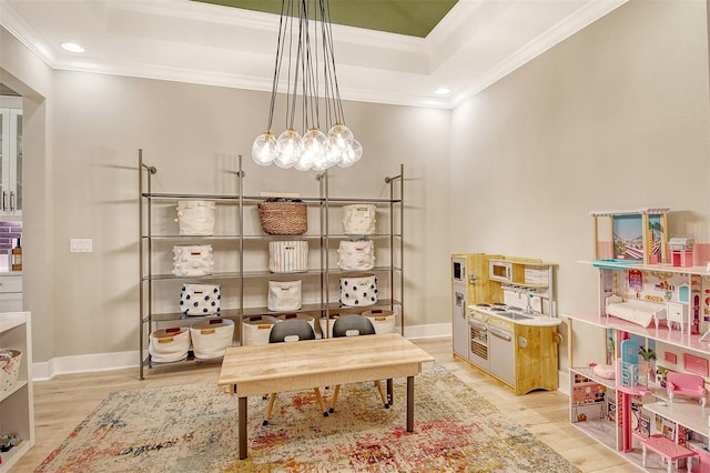 1919 Woodleaf Hammock Ct, Bradenton, FL 34211 - office area featuring crown molding, light wood-style flooring, a tray ceiling, recessed lighting, and baseboards
