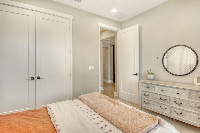 1919 Woodleaf Hammock Ct, Bradenton, FL 34211 - bedroom with a closet, recessed lighting, and baseboards