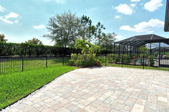 1919 Woodleaf Hammock Ct, Bradenton, FL 34211 - view of patio / terrace featuring glass enclosure