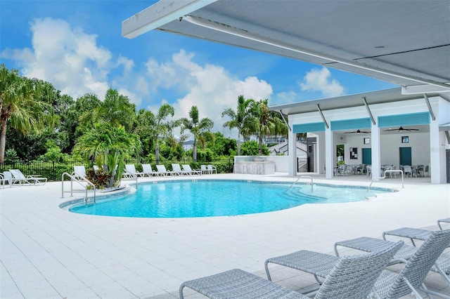 1919 Woodleaf Hammock Ct, Bradenton, FL 34211 - community pool with ceiling fan and a patio area
