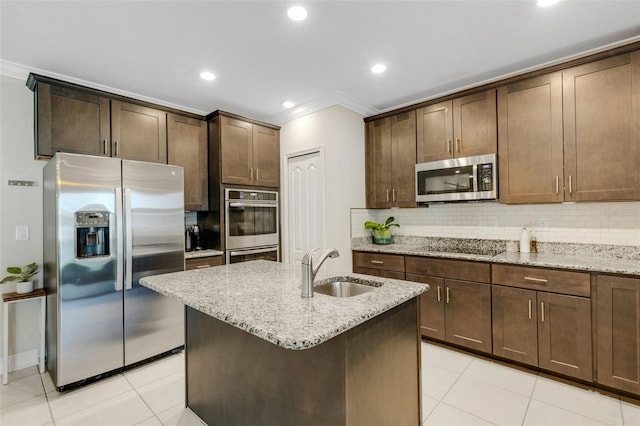 2332 Mizner Bay Ave, Bradenton, FL 34208 - kitchen featuring appliances with stainless steel finishes, ornamental molding, light stone counters, decorative backsplash, and light tile patterned floors