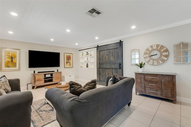 2332 Mizner Bay Ave, Bradenton, FL 34208 - living room with a barn door, recessed lighting, ornamental molding, and light tile patterned flooring
