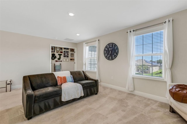 2332 Mizner Bay Ave, Bradenton, FL 34208 - living room with carpet floors, healthy amount of natural light, and recessed lighting