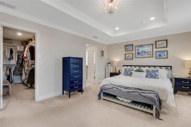 2332 Mizner Bay Ave, Bradenton, FL 34208 - carpeted bedroom with a spacious closet, recessed lighting, ornamental molding, a closet, and a raised ceiling