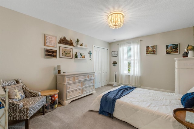 2332 Mizner Bay Ave, Bradenton, FL 34208 - carpeted bedroom featuring a closet and a chandelier