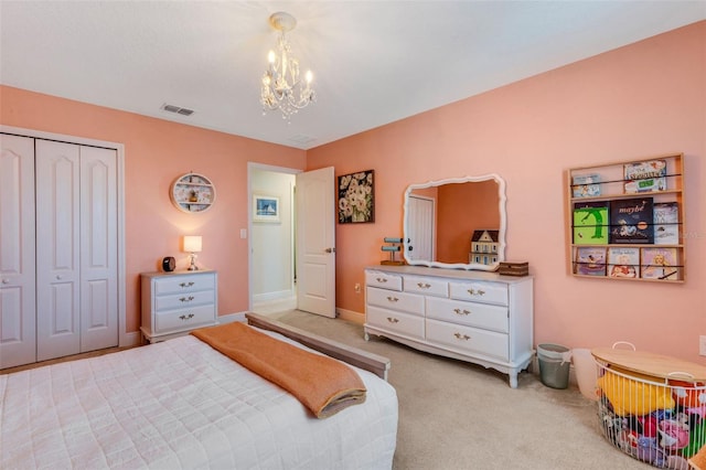 2332 Mizner Bay Ave, Bradenton, FL 34208 - bedroom with a chandelier, a closet, and light colored carpet