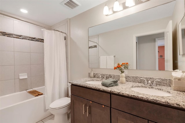 2332 Mizner Bay Ave, Bradenton, FL 34208 - full bathroom featuring double vanity, shower / bathtub combination with curtain, and tile patterned flooring
