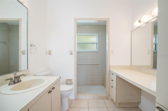 5639 Blount Ave, Sarasota, FL 34231 - bathroom with toilet, vanity, a shower stall, and tile patterned flooring