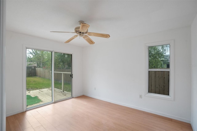 5639 Blount Ave, Sarasota, FL 34231 - spare room featuring plenty of natural light, light wood-style flooring, and a ceiling fan