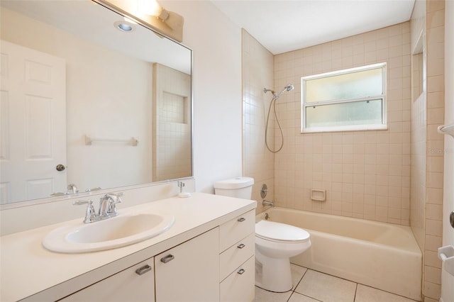 5639 Blount Ave, Sarasota, FL 34231 - bathroom with vanity, tile patterned floors, shower / bathtub combination, and toilet