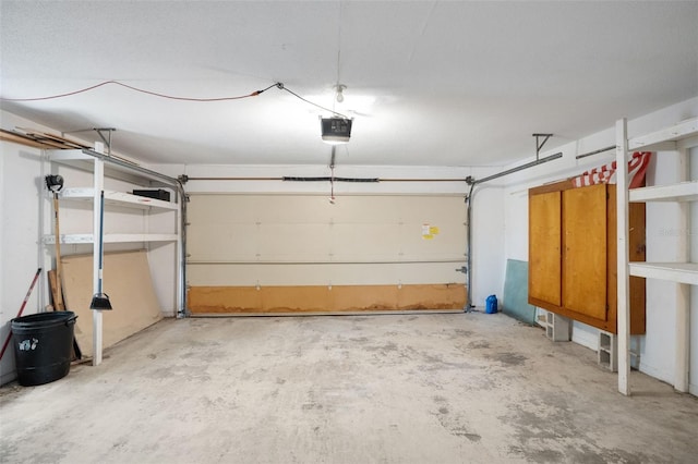 5639 Blount Ave, Sarasota, FL 34231 - garage featuring a garage door opener