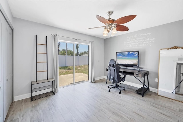 3429 97th Ln E, Palmetto, FL 34221 - office area with a ceiling fan, wood finished floors, and baseboards