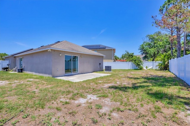 3429 97th Ln E, Palmetto, FL 34221 - back of house featuring central air condition unit, a patio, and stucco siding