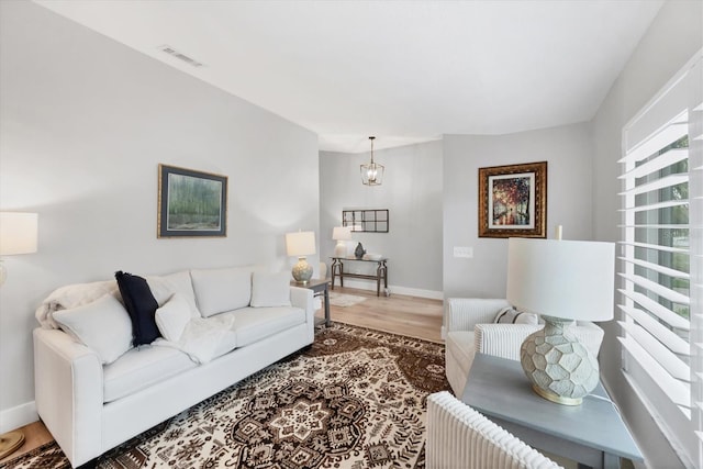 4844 14th Ave E, Bradenton, FL 34208 - living room featuring wood finished floors and baseboards
