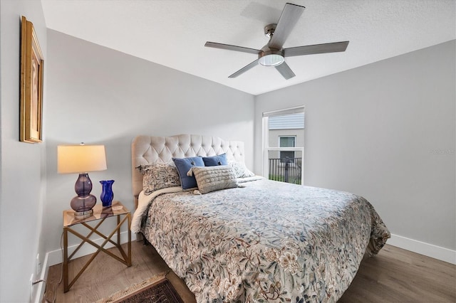 4844 14th Ave E, Bradenton, FL 34208 - bedroom with wood finished floors, baseboards, and a ceiling fan
