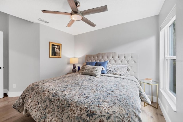 4844 14th Ave E, Bradenton, FL 34208 - bedroom featuring wood finished floors, baseboards, and a ceiling fan