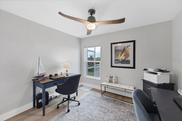 4844 14th Ave E, Bradenton, FL 34208 - office with wood finished floors, baseboards, and ceiling fan
