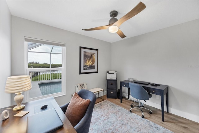 4844 14th Ave E, Bradenton, FL 34208 - office space featuring wood finished floors, ceiling fan, and baseboards