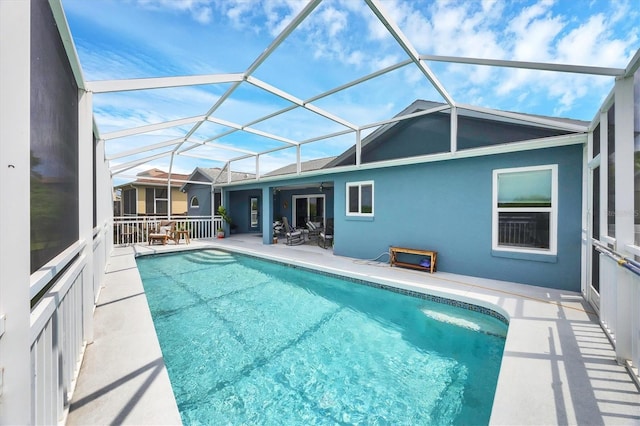 4844 14th Ave E, Bradenton, FL 34208 - outdoor pool featuring a patio and glass enclosure