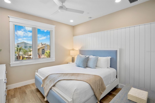 135 Avenida Veneccia, Sarasota, FL 34242 - bedroom featuring wood finished floors, recessed lighting, and ceiling fan