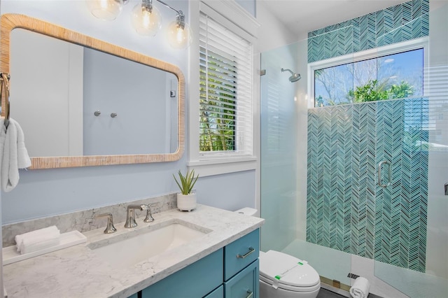 135 Avenida Veneccia, Sarasota, FL 34242 - bathroom with vanity, a stall shower, and healthy amount of natural light