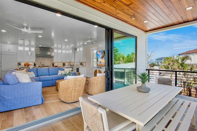 135 Avenida Veneccia, Sarasota, FL 34242 - balcony featuring a ceiling fan and an outdoor hangout area