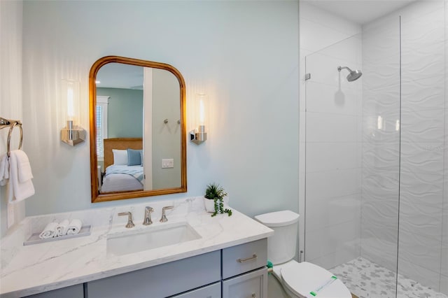135 Avenida Veneccia, Sarasota, FL 34242 - bathroom featuring connected bathroom, vanity, and a tile shower