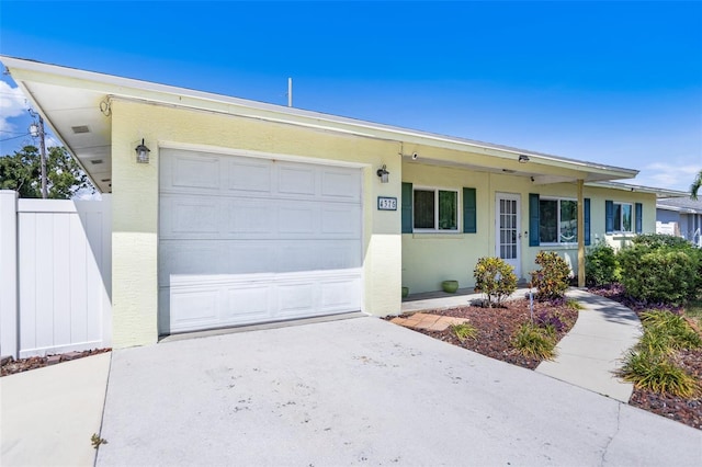 4375 Tortoise Rd, Venice, FL 34293 - ranch-style house with an attached garage, driveway, and stucco siding