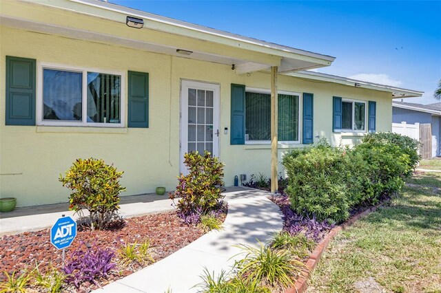 4375 Tortoise Rd, Venice, FL 34293 - property entrance with stucco siding