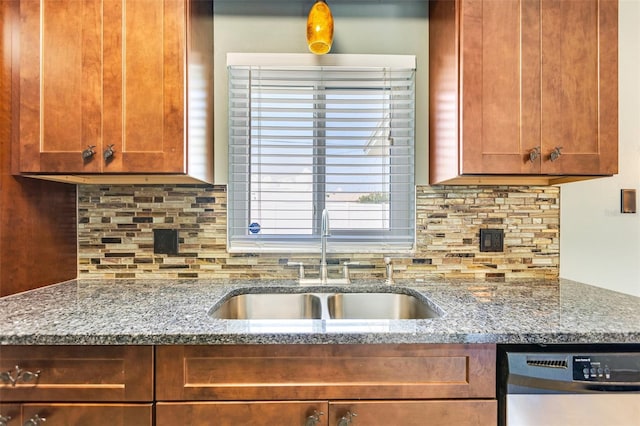 4375 Tortoise Rd, Venice, FL 34293 - kitchen with a sink, dishwasher, and stone counters