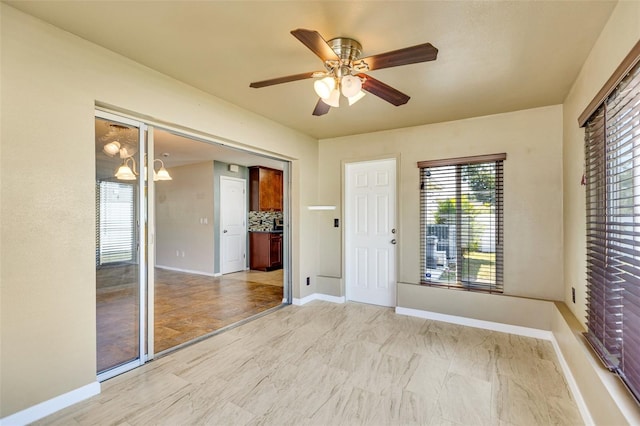4375 Tortoise Rd, Venice, FL 34293 - spare room with ceiling fan, baseboards, and healthy amount of natural light