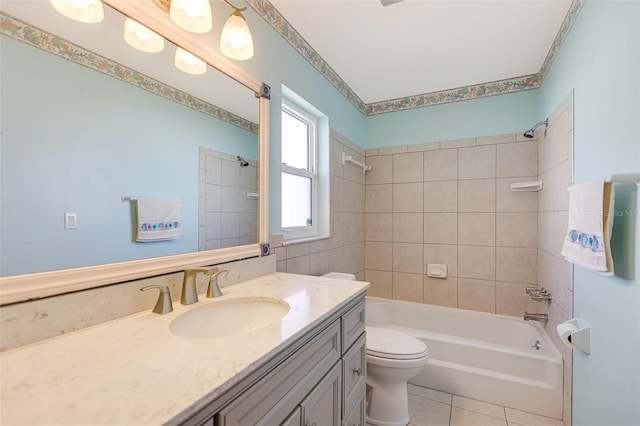 4375 Tortoise Rd, Venice, FL 34293 - bathroom featuring toilet, vanity, bathing tub / shower combination, and tile patterned floors