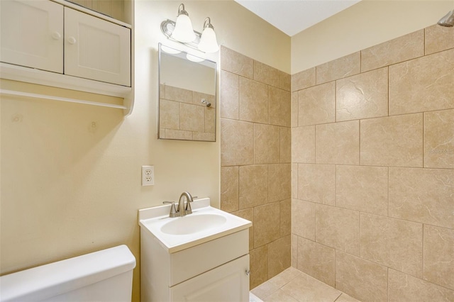 4375 Tortoise Rd, Venice, FL 34293 - full bathroom with toilet, vanity, and tiled shower