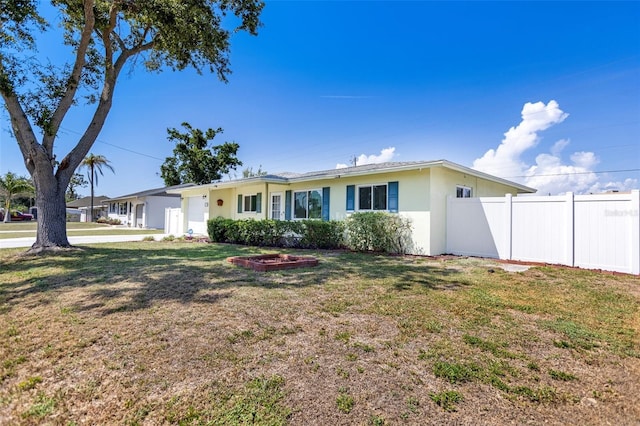 4375 Tortoise Rd, Venice, FL 34293 - ranch-style home with stucco siding and a garage