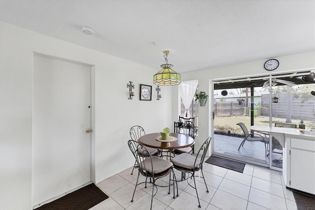 4535 Maceachen Blvd, Sarasota, FL 34233 - dining space featuring light tile patterned floors